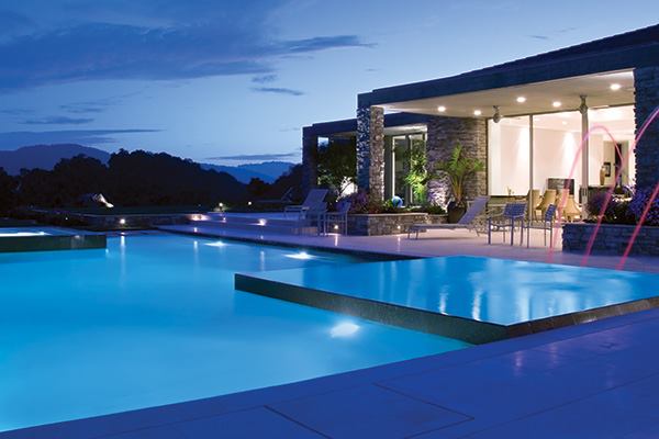 TRIPLE THREAT Three perimeter overflow edge techniques seamlessly integrate for a stunning pool project.