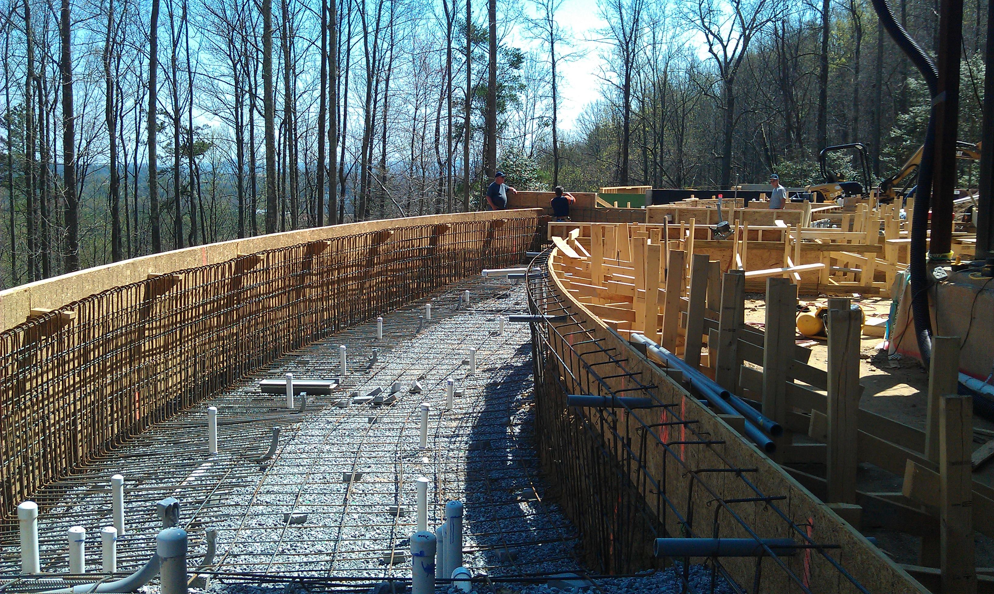 When you build a vanishing-edge wall that long, your main concern is its structural integrity. It’s not about the weight of the water, it’s about the expansion and contraction of the concrete. It becomes more like a dam. It’s the same consideration that an engineer goes through when he’s designing any large concrete structure. Thermal expansion becomes one of your major design parameters. So there is a lot of steel – no. 5 bars at 4- or 6 inches on center.