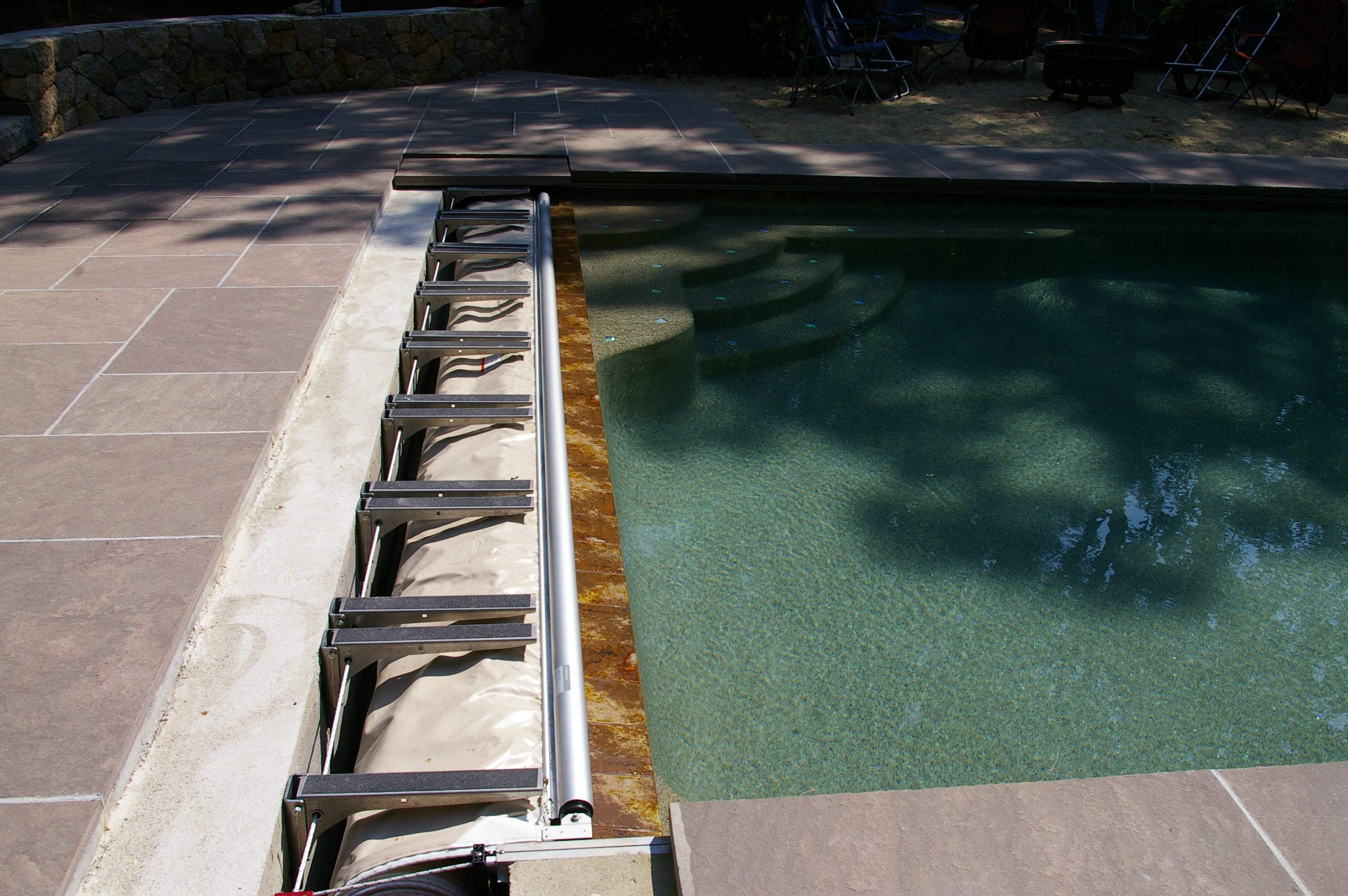 Many of John Viola’s clients request hidden vault lids when they order their covers. The photo shows an example of a vault open up for cleaning. Accumulated debris should be removed at least once a year.