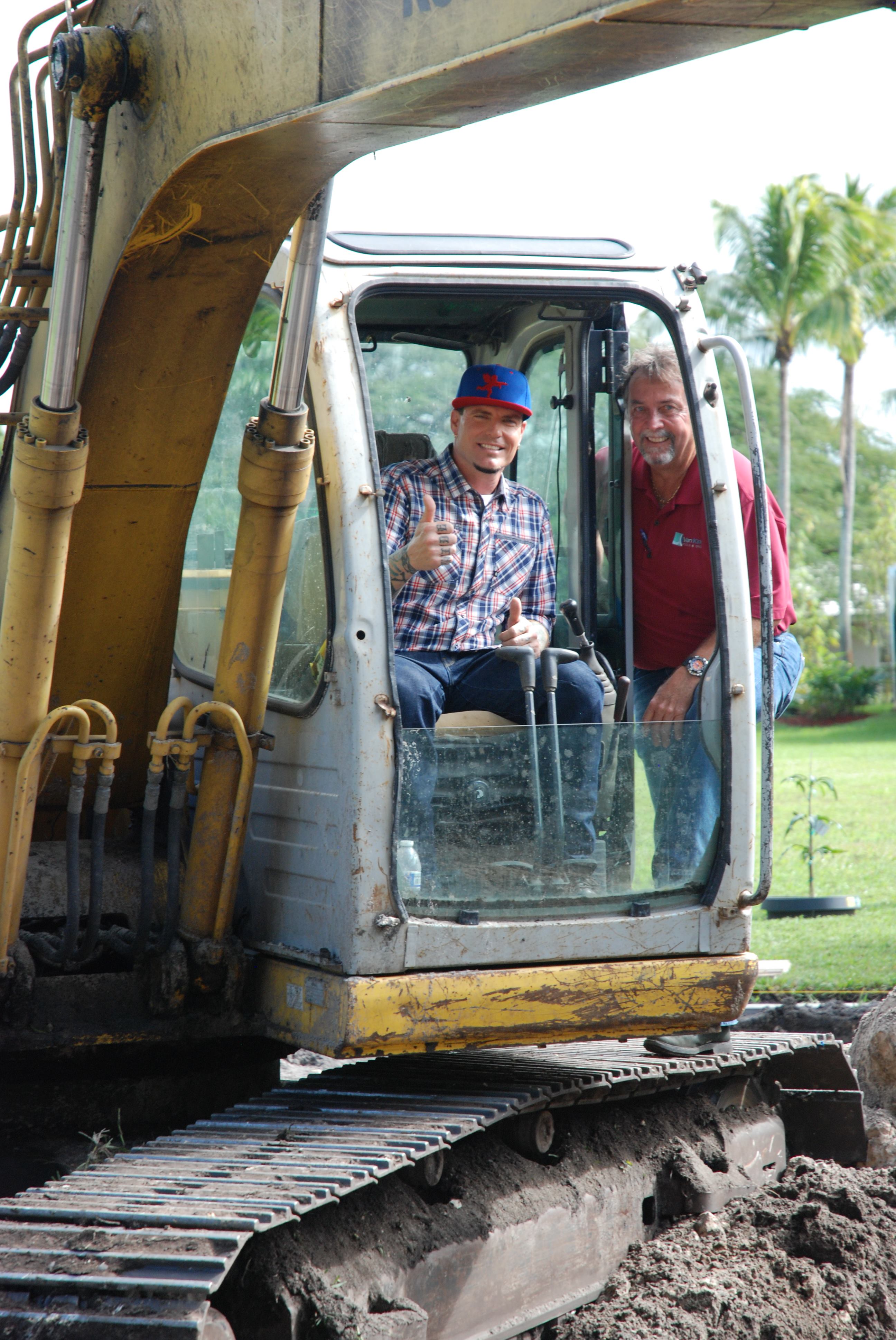 Rob Van Winkle (left) and Bobby Van Kirk get ready to break ground on the Avilez pool.