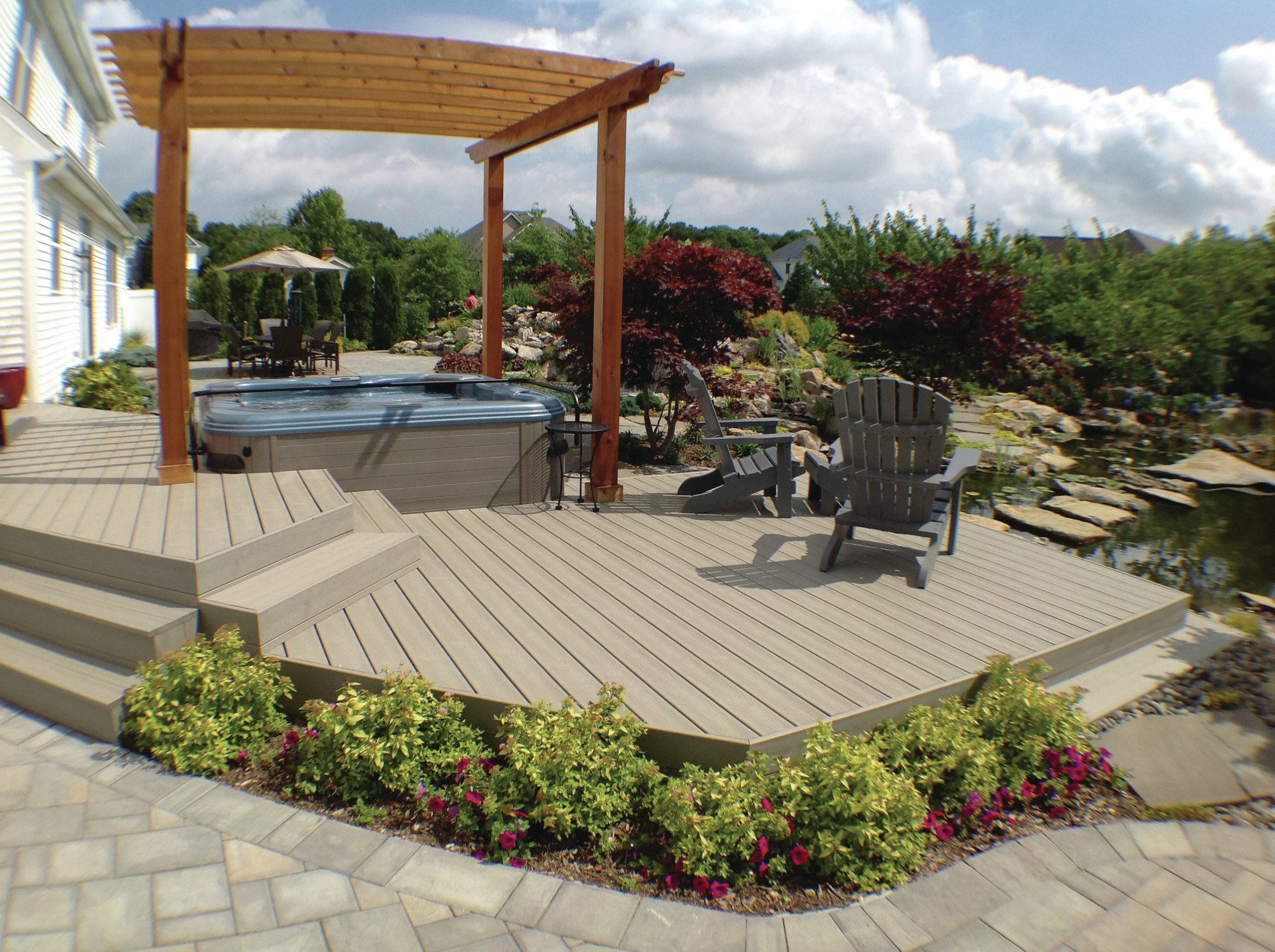 Complementary finishing materials maintain design integrity while still signaling a separate room.