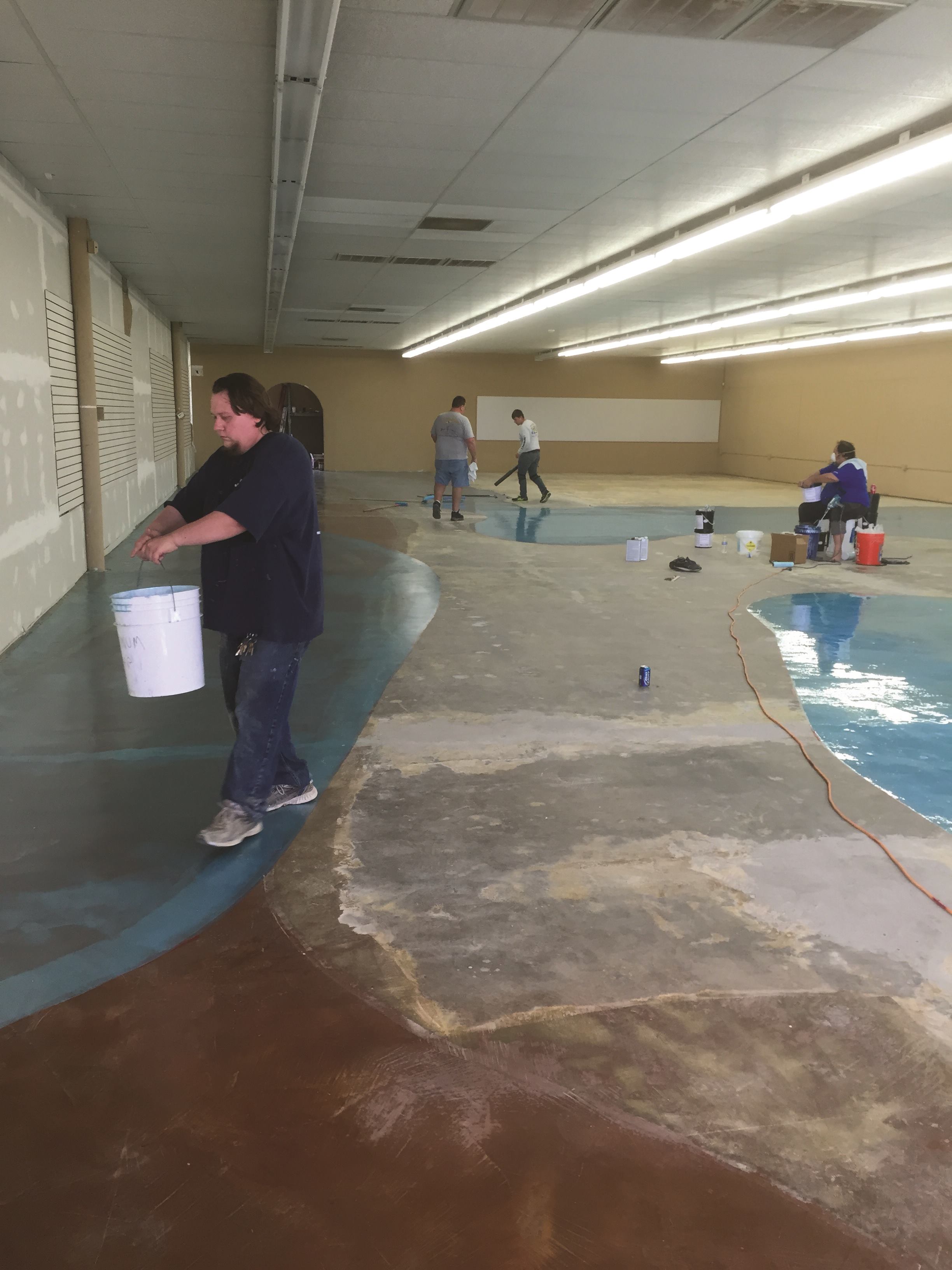 B&L Pools employees applied an epoxy finish to the floor.