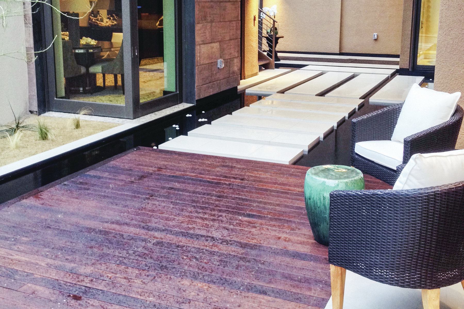 Floating walkway: This is just one way Anthony & Sylvan incorporated water elements into the design of The New American Home 2014. Visit poolspanews.com to see additional images. 