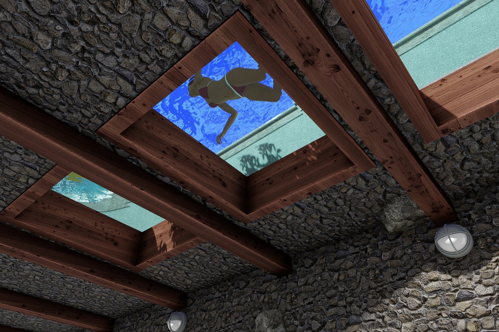 Windows in the lazy-river floor as seen from the underground go-kart track.