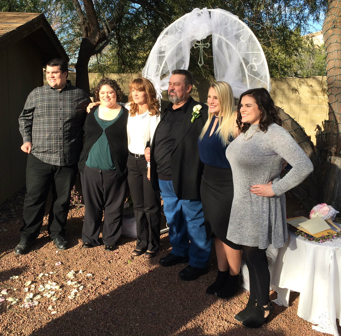 Garrett and wife Shawna, center, on their wedding day in 2015. They are flanked by Garrett’s children, from left, Shawn, Brenna, Kellie and Allie.