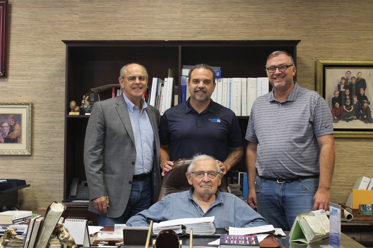 Standing left to right: Shasta CEO Skip Ast Jr.; Director of Sales Skip Ast III; and Director of Poolcare and Outdoor Environments Dave Lewis. Seated: Founder Skip Ast Sr.