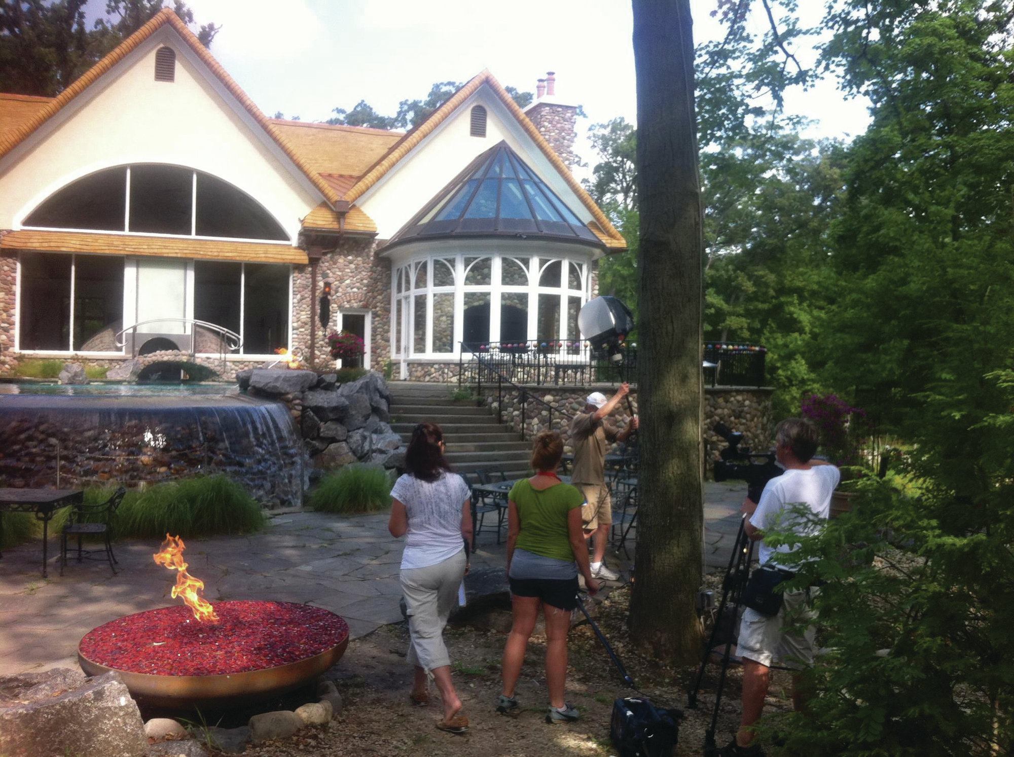 Lights, camera, action: Two pools by Platinum Poolcare Aquatech Ltd. have been featured on TV shows. Here, different film crews focus on shots for the Shell project.