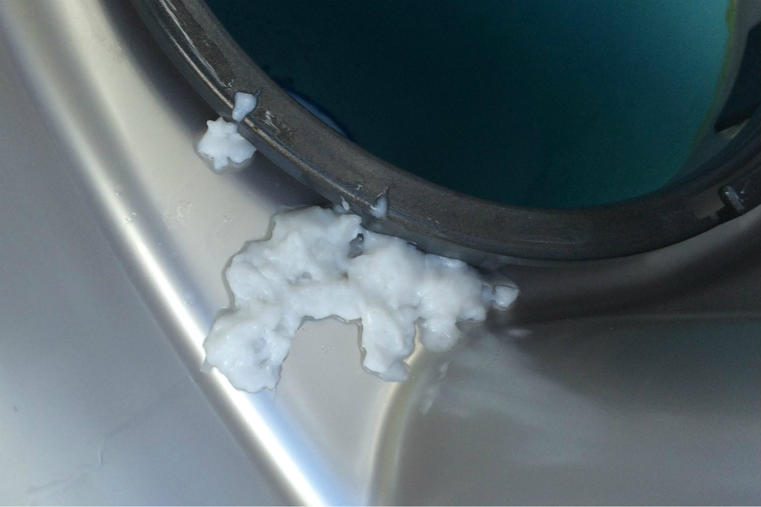 Gunky residue is what remains after running Jet Dry, the dishwashing aid, through the system