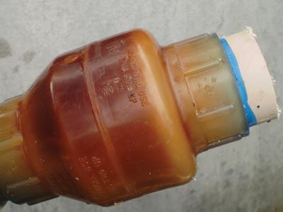 Bad valve: This check valve was leaking, causing the pump to cavitate. It was easy to isolate this damaged part, but not all leaky valves look so suspicious.