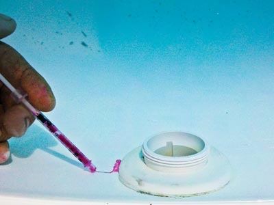Add some color: Using a syringe without a needle, inject a small amount of dye or food coloring into the water, about an inch from the spot where you suspect the leak may be.