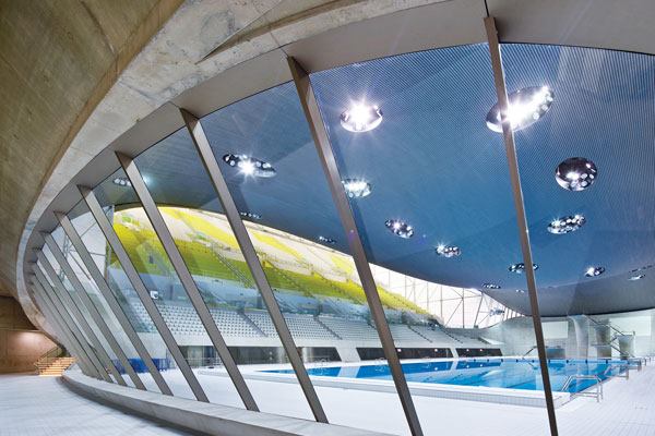 Flexible DesignLighting is designed to allow Olympic events to be filmed in HD. Other features are meant to support more long-term use. The pool includes a traversable boom at one end that allows the pool length to be accurately set, and a submersible boom with a movable floor at the opposite end, to create a flexible space.