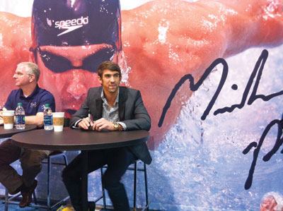 The

champ: Michael Phelps, the most decorated Olympian of all

time, cut the ribbon to start the Expo, then signed autographs at

the Master Spas booth.