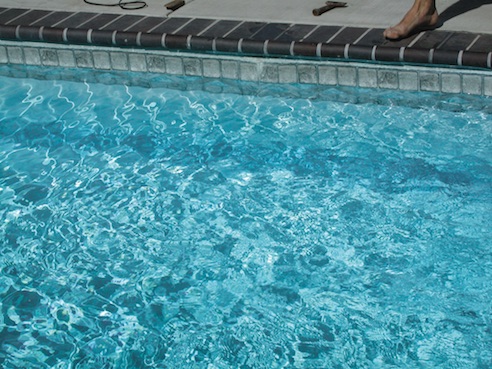 4. With the liner now back in proper position in the track, it has been pulled taut and the smiley has vanished.       