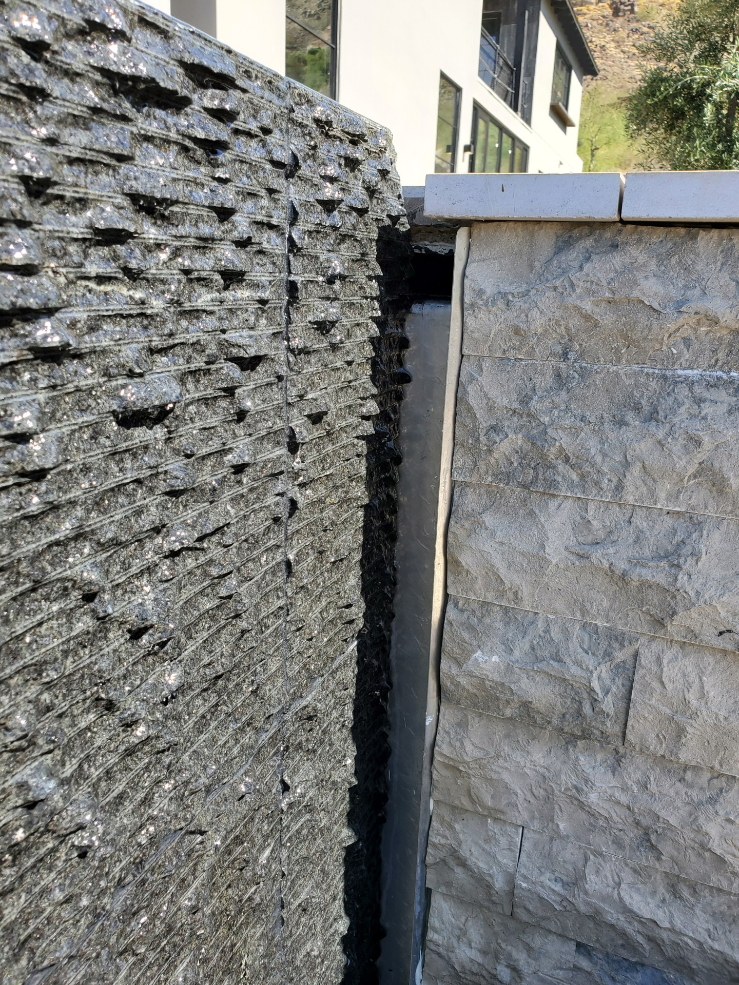 Red Rock Pools & Spas employs a detail that it calls a wick channel to separate the adjacent surface, thereby protecting its finish.