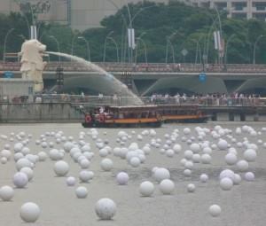 Wishing spheres bob on Singapore's Marina Bay.