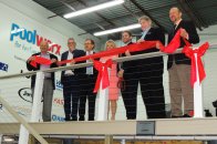 Assembling for the ribbon-cutting ceremony: (l-r) Steve Nimocks of Lonza, Carlos Franquesa of Fluidra; John and Helen O’Brien of Poolwerx; Farmer’s Branch, Texas Mayor Robert Dye; Greg Howard of Carecraft; and Thomas Lachocki, Ph.D. of NSPF.